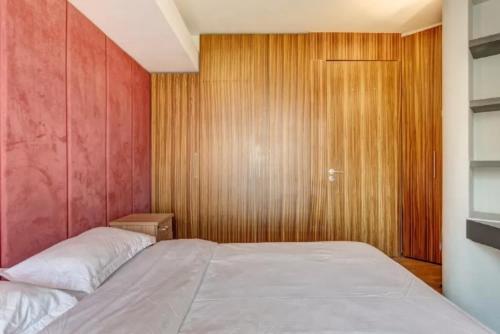 Postel nebo postele na pokoji v ubytování Beijing Yasmine Seasons Park Apartment Hotel