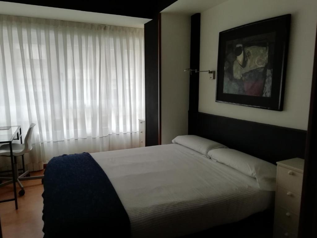 Postel nebo postele na pokoji v ubytování Hostel Costa Gijon