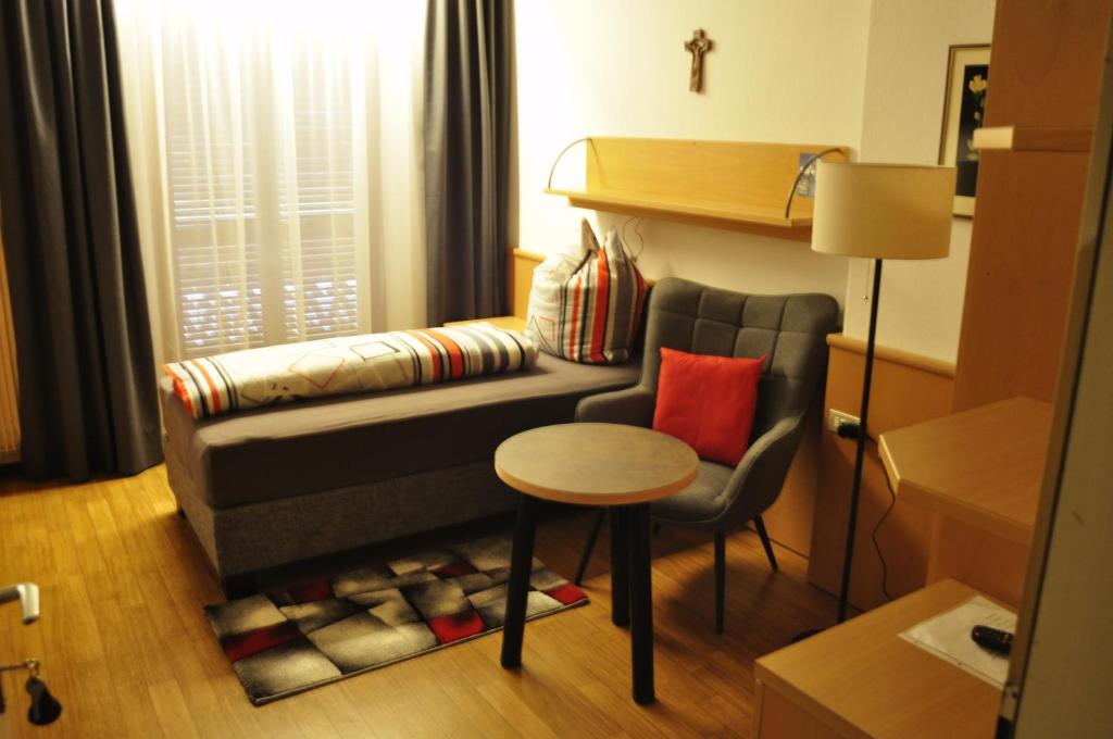 Postel nebo postele na pokoji v ubytování Garni Schwarzenstein