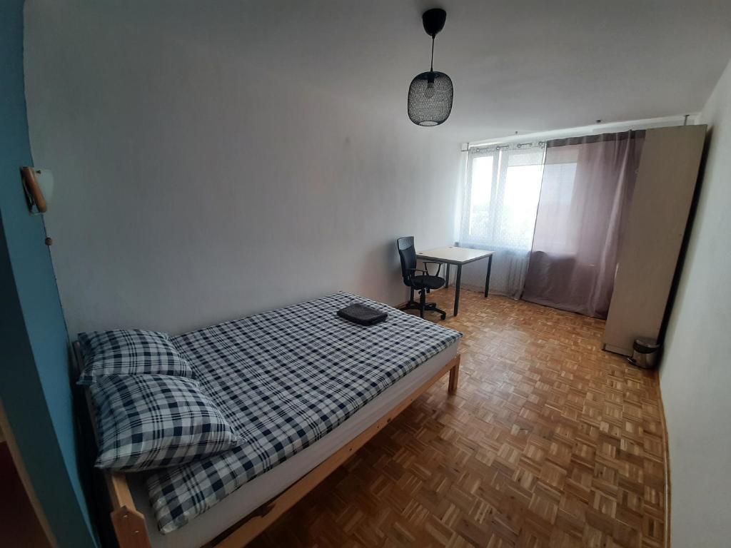 Postel nebo postele na pokoji v ubytování Ivory House (Marymont-Ruda)