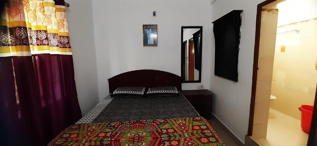 Postel nebo postele na pokoji v ubytování Durga budget stay