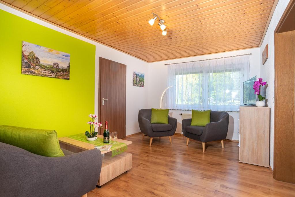 Posezení v ubytování Pension Am Weinberg Sächsische Schweiz