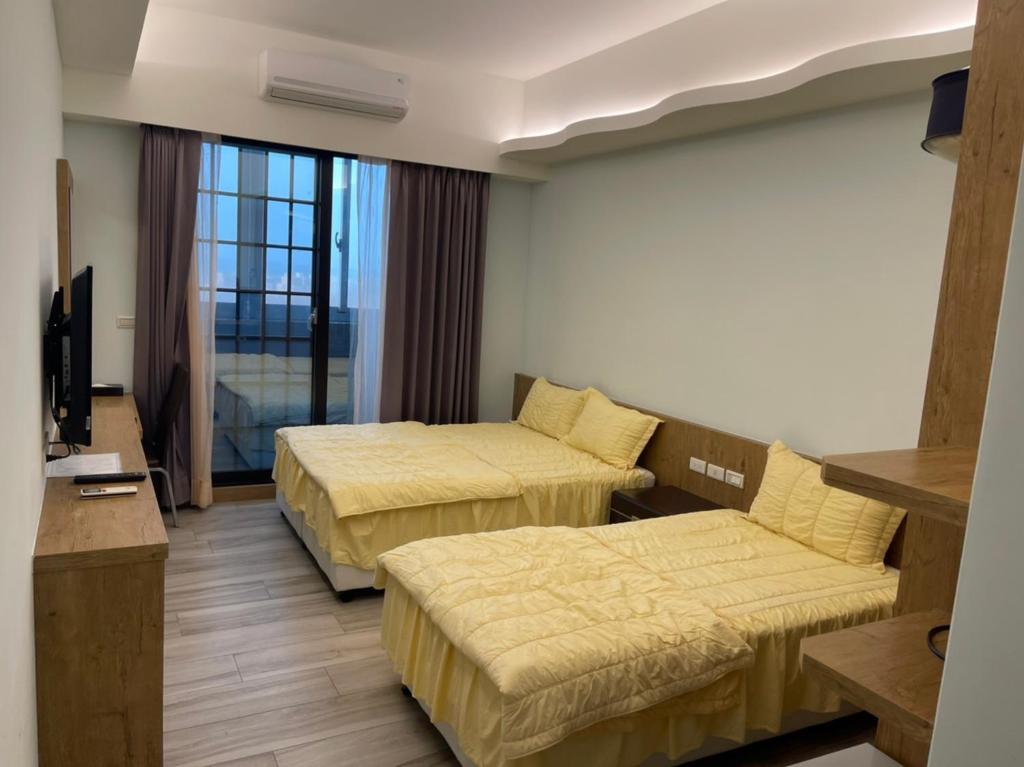 TV a/nebo společenská místnost v ubytování Shun Cheng Hotel