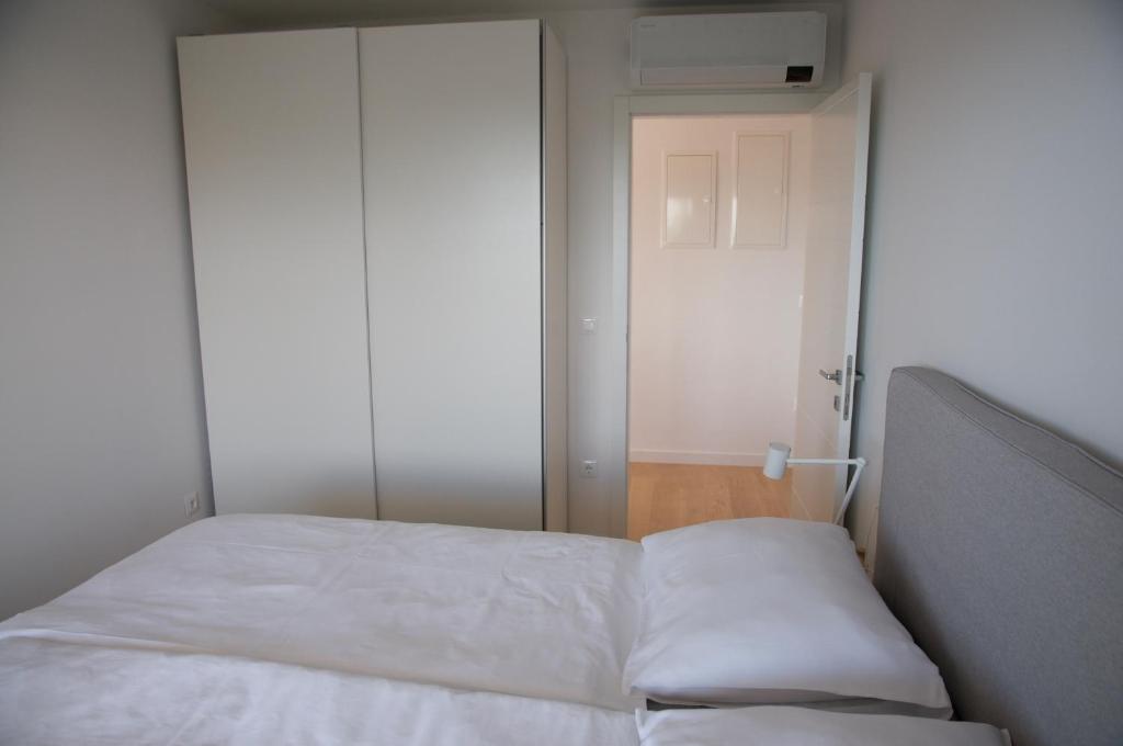 Posteľ alebo postele v izbe v ubytovaní Nikola Luxury Apartments Borik