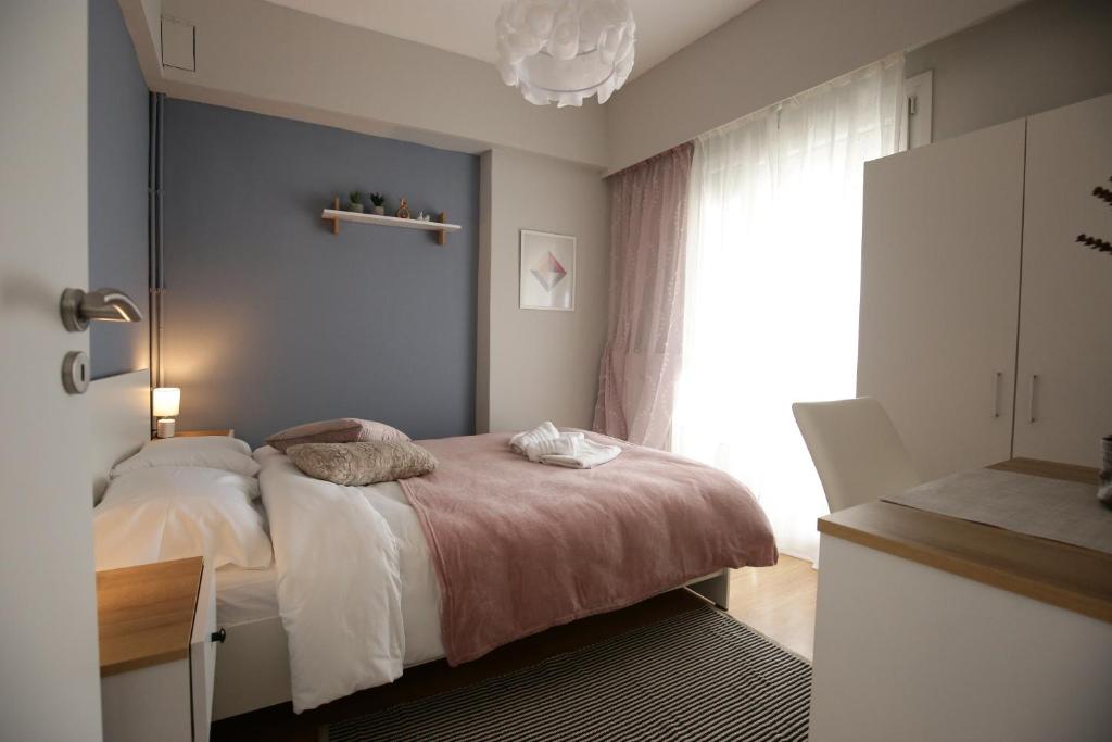 Ένα ή περισσότερα κρεβάτια σε δωμάτιο στο Aigli sea view