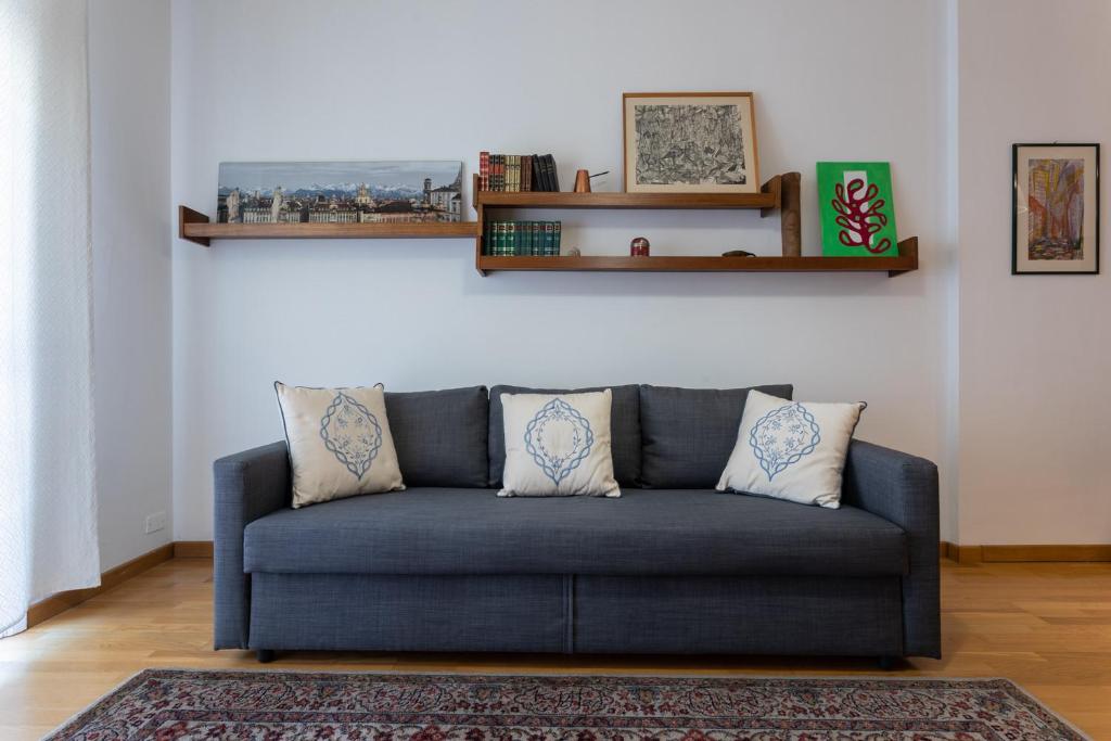 A seating area at Casa Torricelli in zona Crocetta by Wonderful Italy