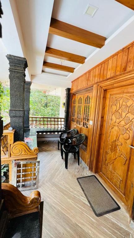 Posezení v ubytování Golden Cypress Resort with Pool -Wayanad