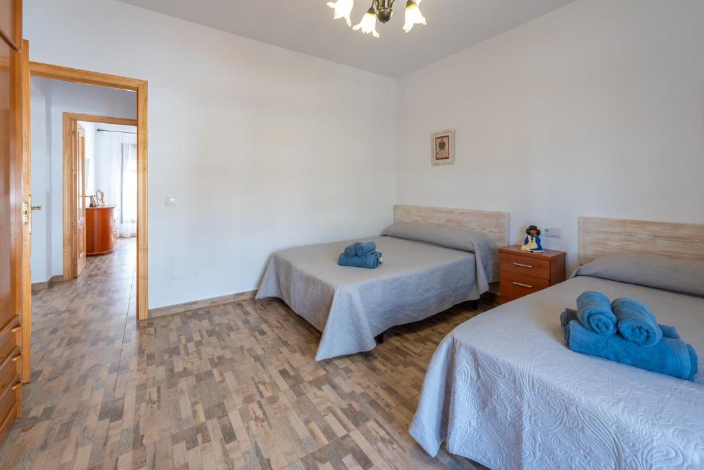 Postel nebo postele na pokoji v ubytování Villa El Retiro