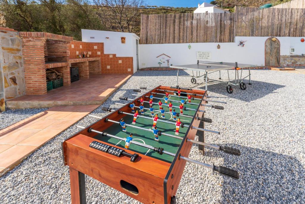 Stolní tenis v ubytování Villa El Retiro nebo okolí