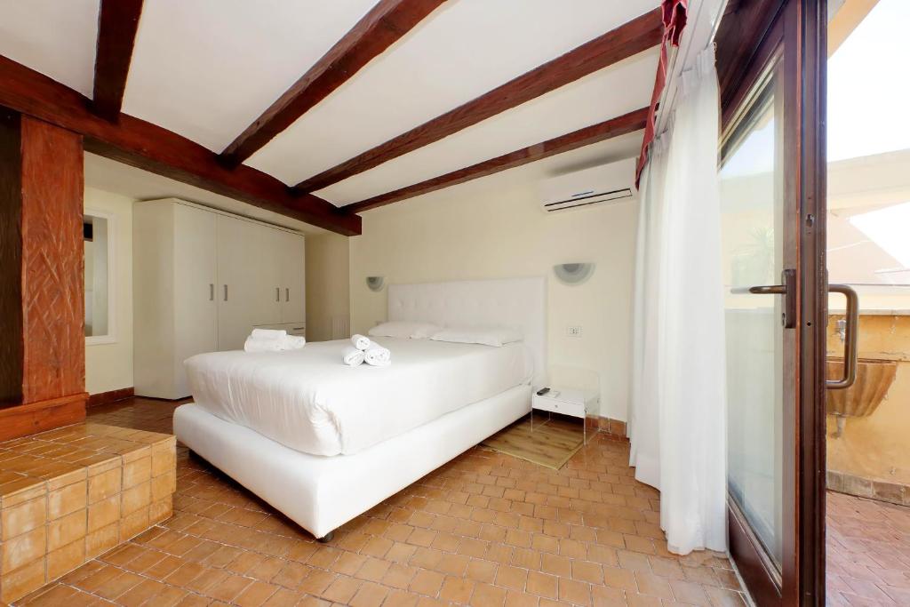 Posteľ alebo postele v izbe v ubytovaní Trevi Rome Suite