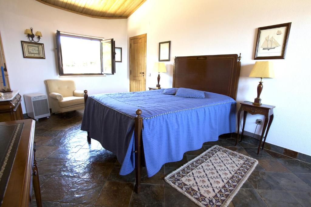 Кровать или кровати в номере Quinta Dos Moinhos De Sao Filipe
