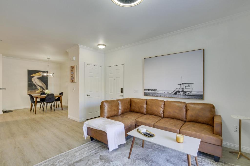 a living room with a couch and a table at Modern Pet-Friendly San Diego Vacation Rental in San Diego