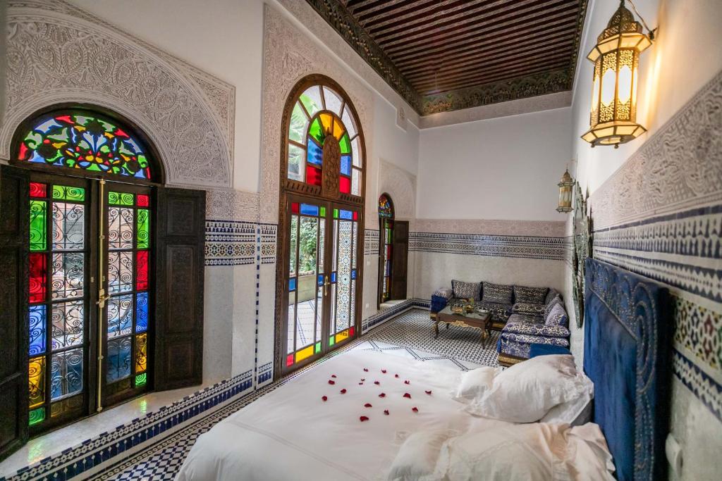 Postel nebo postele na pokoji v ubytování Riad Semlalia