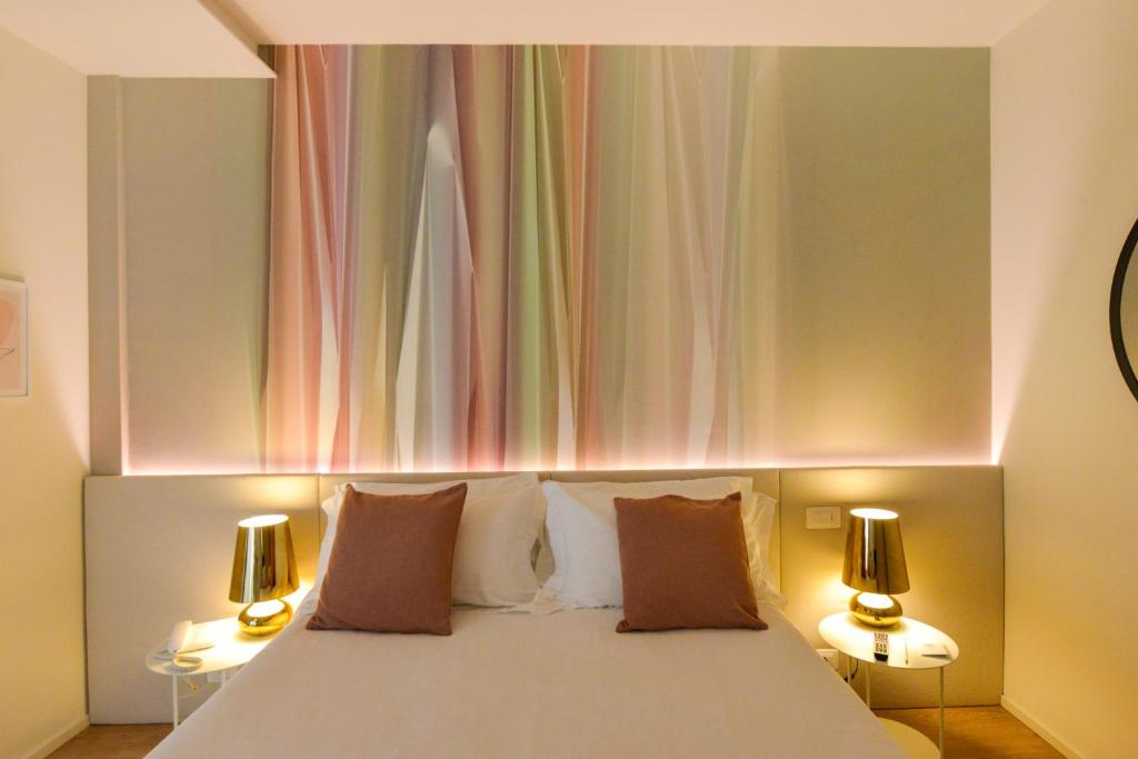 Postel nebo postele na pokoji v ubytování Hotel Elite