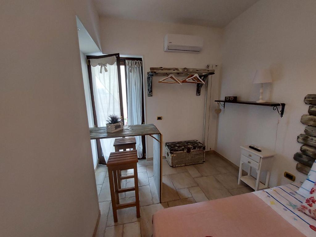 Postel nebo postele na pokoji v ubytování Mama Damì