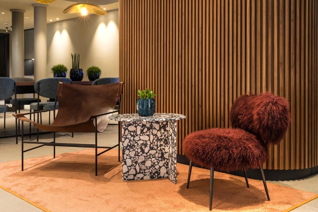 Posezení v ubytování LUGANODANTE Boutique & Lifestyle Hotel