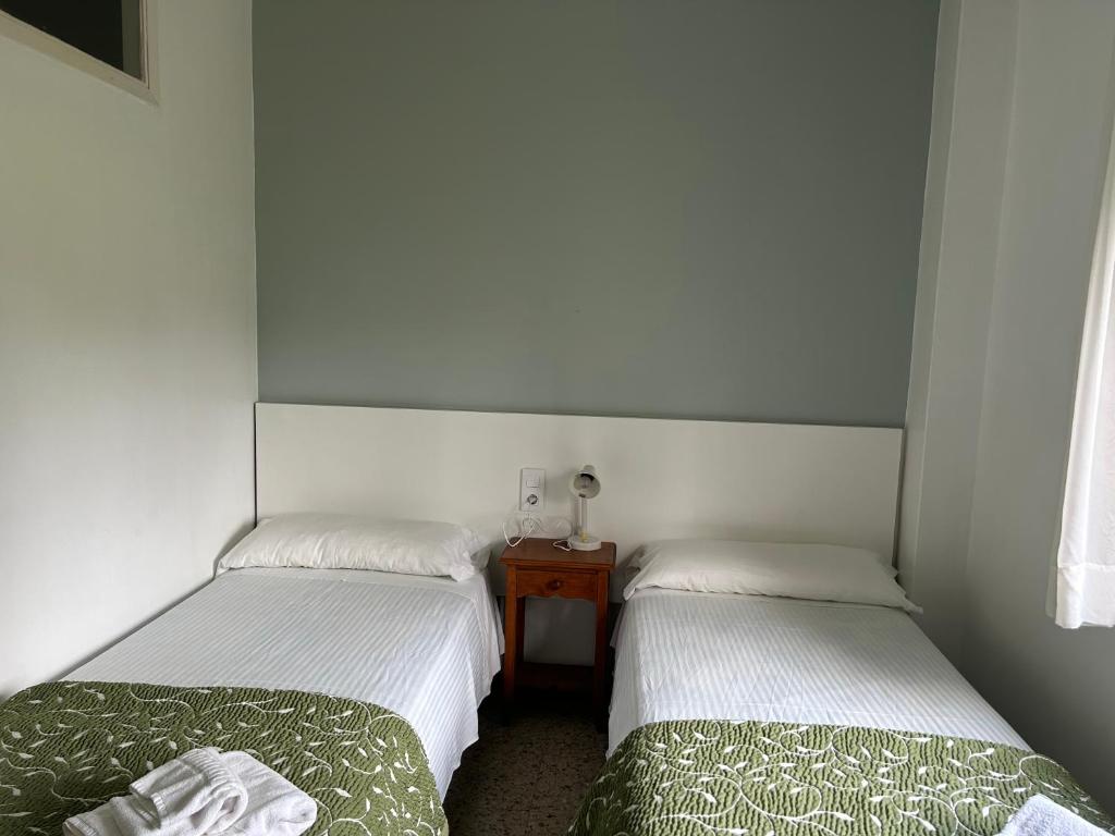 Postel nebo postele na pokoji v ubytování Pazo Pias P