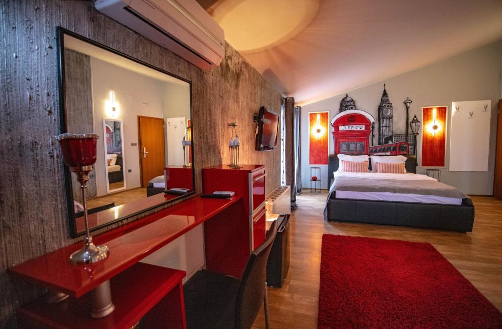 Postel nebo postele na pokoji v ubytování Hotel Pamela Concept