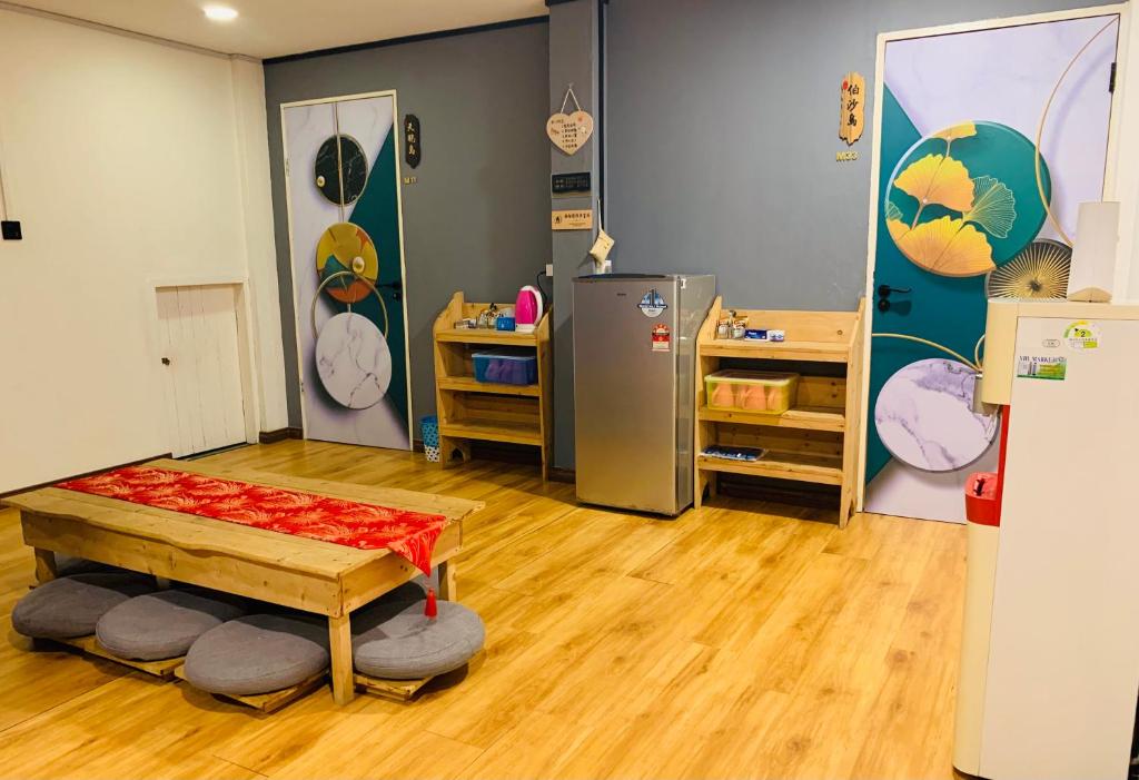 Postel nebo postele na pokoji v ubytování bamboo homestay M2 小竹林 仙本那 榻榻米独栋房源六间房间独立卫生浴 步行码头十分钟