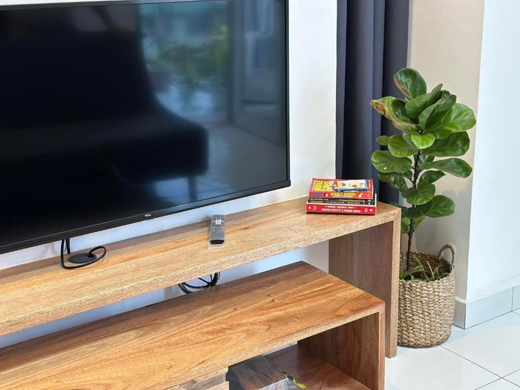 TV a/nebo společenská místnost v ubytování Burj Calapan