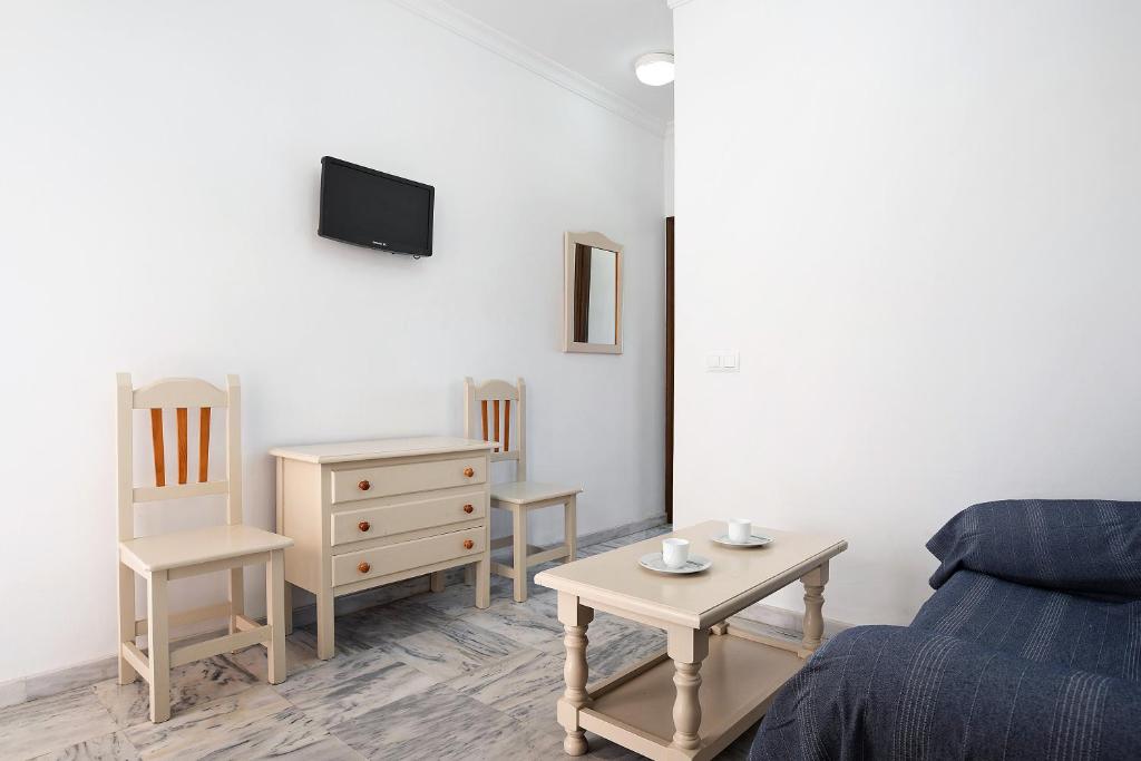 TV a/nebo společenská místnost v ubytování Casa Paloma