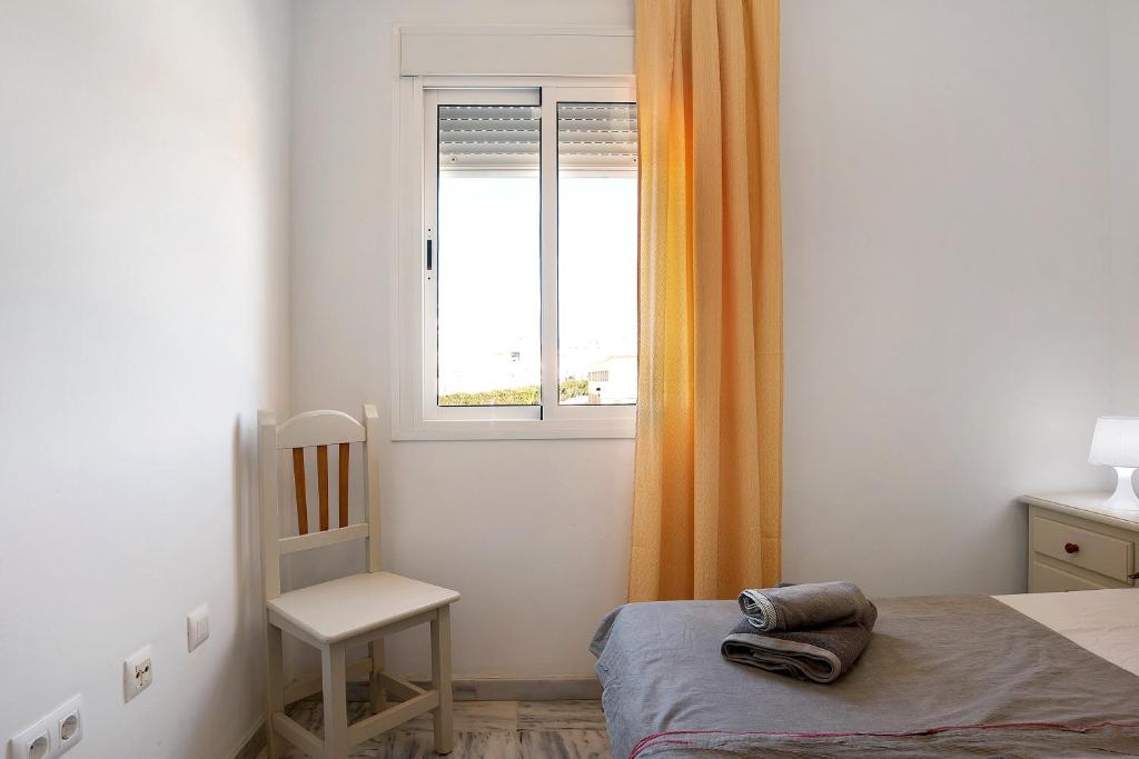 Postel nebo postele na pokoji v ubytování Casa Paloma