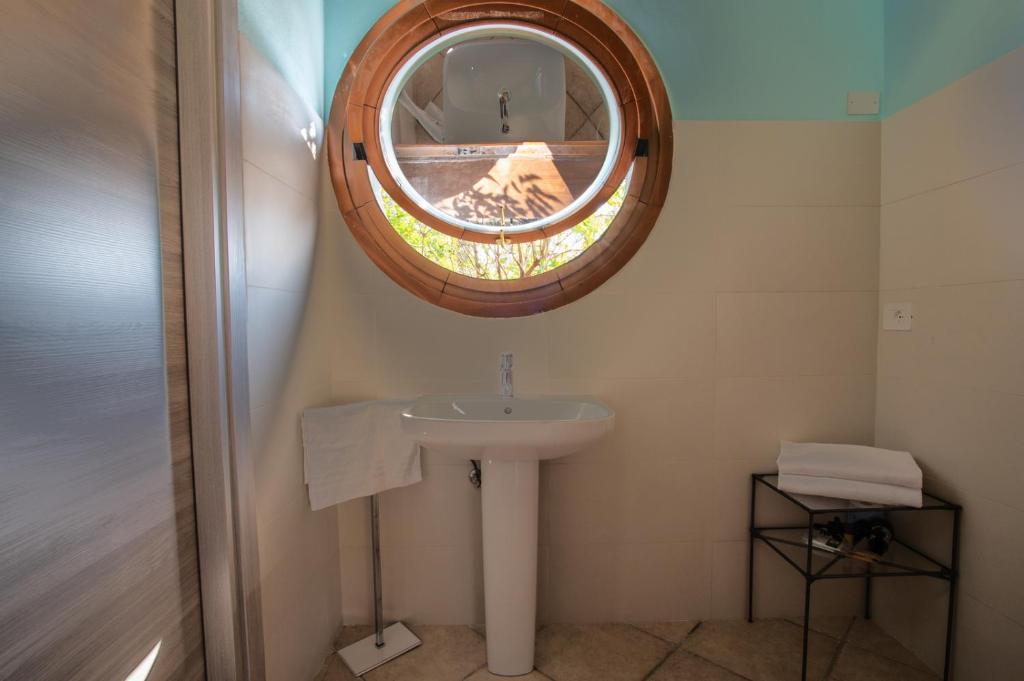 Koupelna v ubytování Hotel Caneo