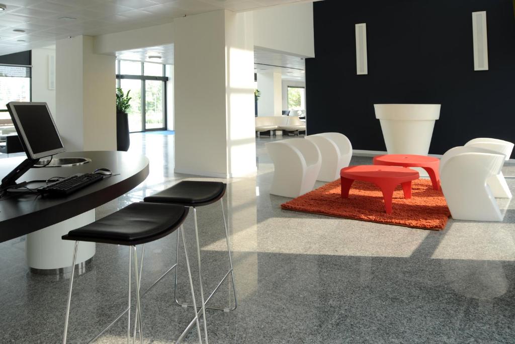 TV a/nebo společenská místnost v ubytování Idea Hotel Milano San Siro
