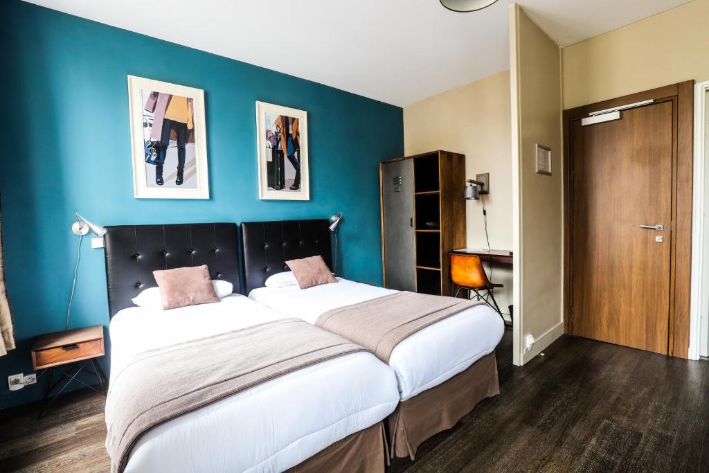 Postel nebo postele na pokoji v ubytování Hotel Des Cedres