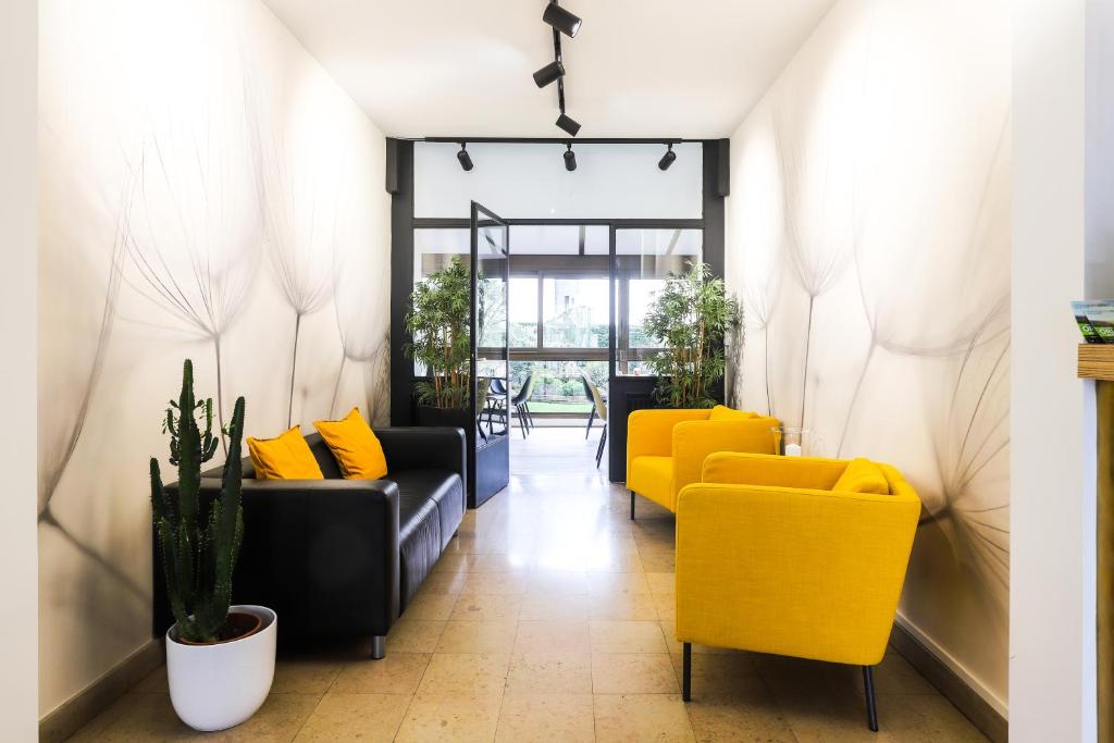 Posezení v ubytování Hotel Des Cedres
