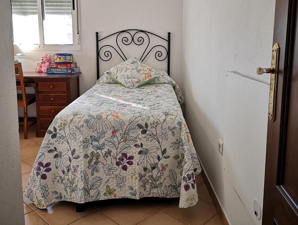 Łóżko lub łóżka w pokoju w obiekcie Casa Rural Cerca de la Playa El Rompido