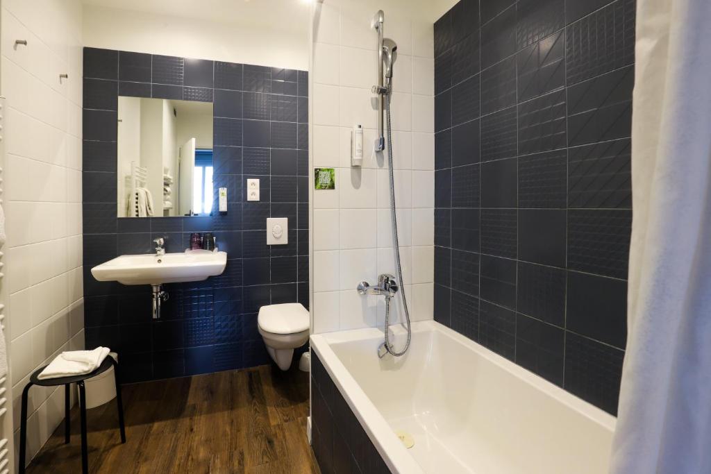 Koupelna v ubytování Hotel Des Cedres