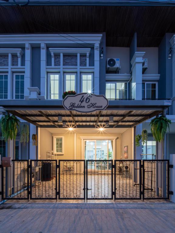 a building with a gate in front of it at 46 Golden House in Chiang Mai