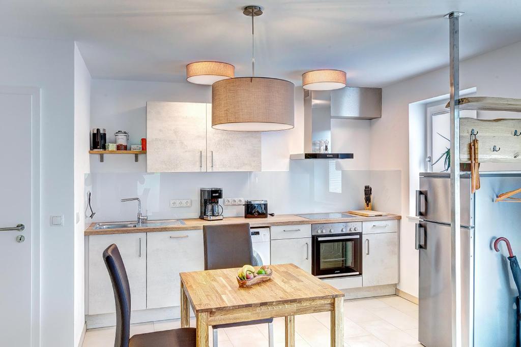Kuchyň nebo kuchyňský kout v ubytování Ferienwohnung Am Rehgarten
