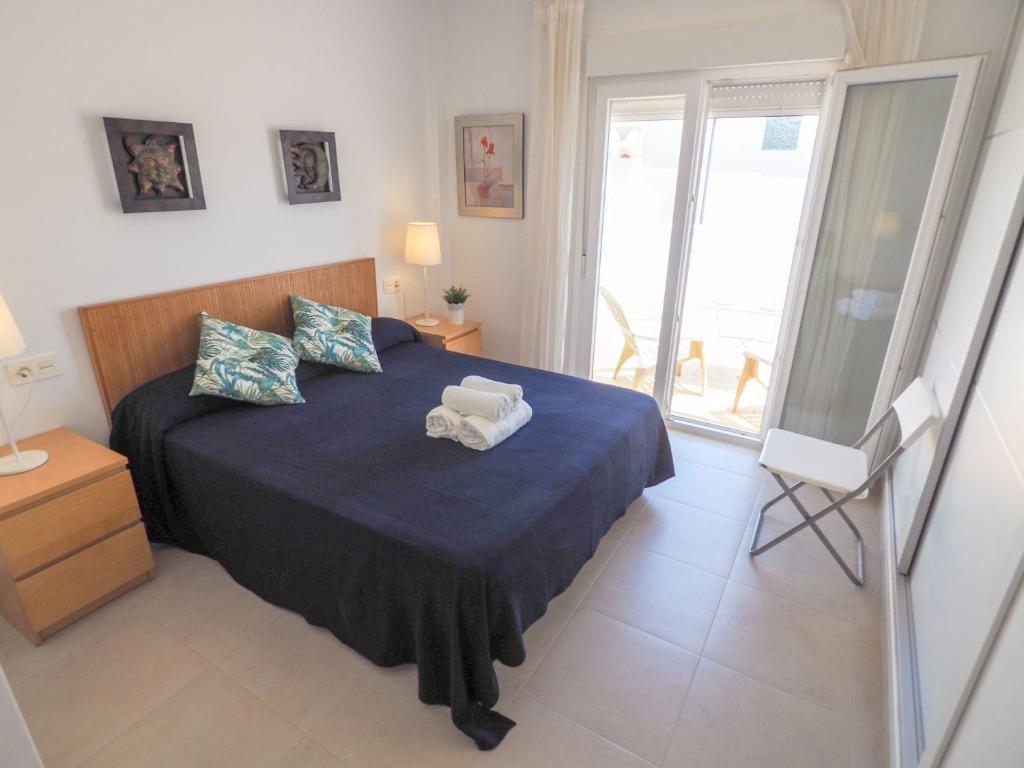 Postel nebo postele na pokoji v ubytování Nerja Paradise Rentals - Villa Topaz