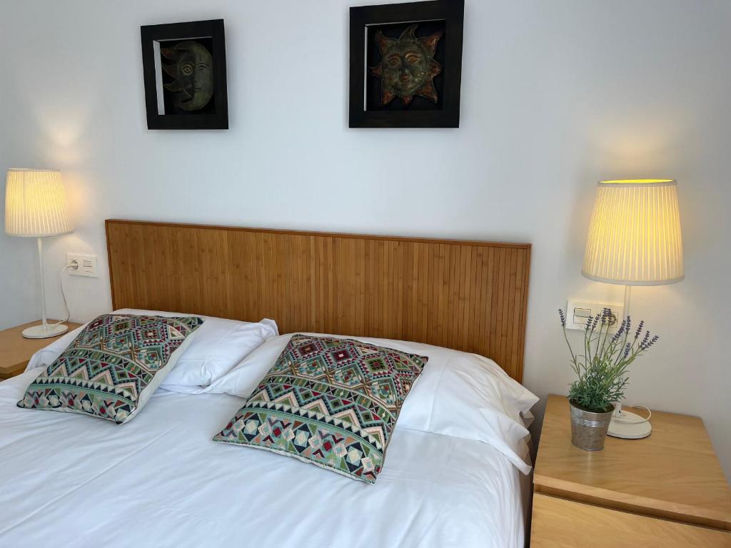 Postel nebo postele na pokoji v ubytování Nerja Paradise Rentals - Villa Topaz