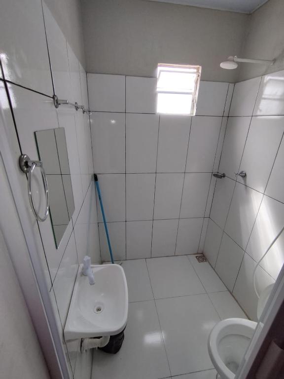 Koupelna v ubytování Hotel Resende