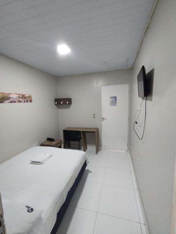TV a/nebo společenská místnost v ubytování Hotel Resende