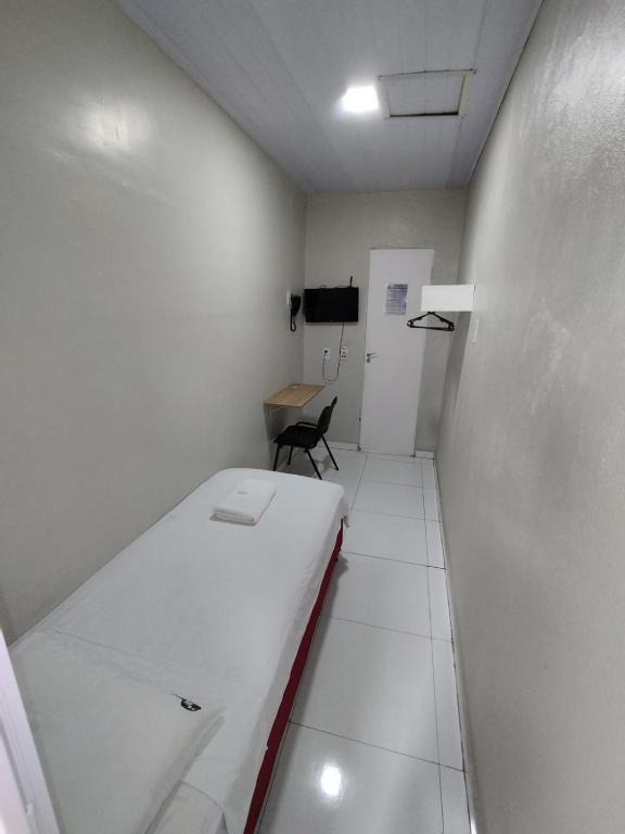 Postel nebo postele na pokoji v ubytování Hotel Resende