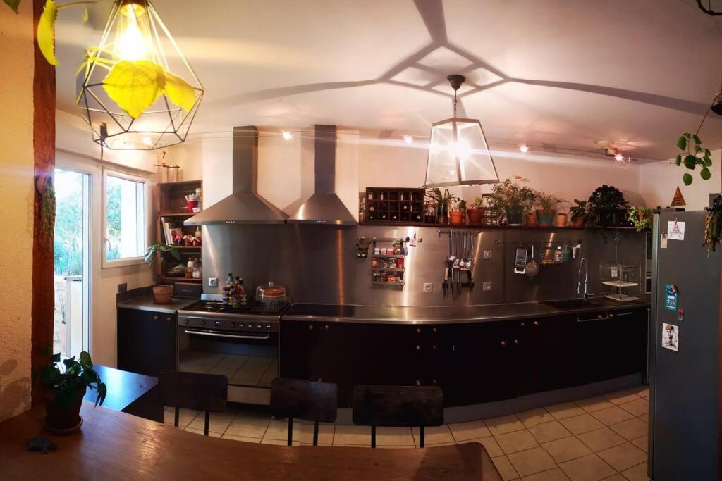 Lounge alebo bar v ubytovaní Gîte au coeur du vignoble de Cahors, 5 chambres