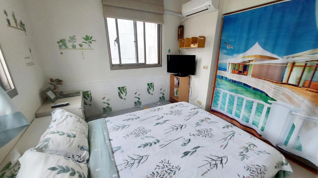 Uma cama ou camas num quarto em 緣心 民宿