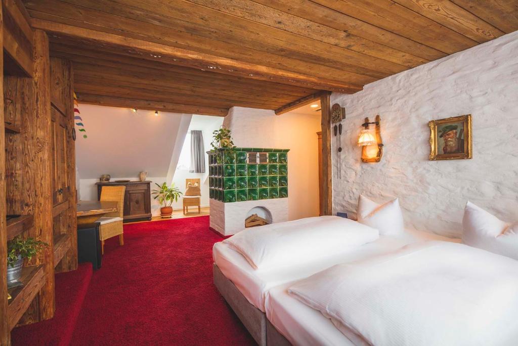 Postel nebo postele na pokoji v ubytování Hotel Luise