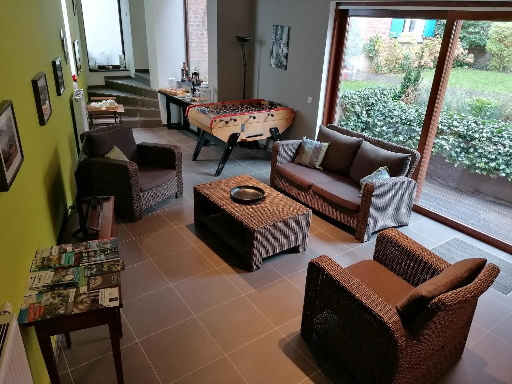 Posezení v ubytování Chambre d'hôte Les Volets Bleus