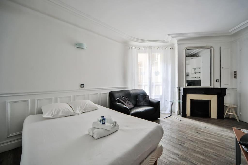 เตียงในห้องที่ Grand Studio Confort#St Germain-Montparnasse#4P