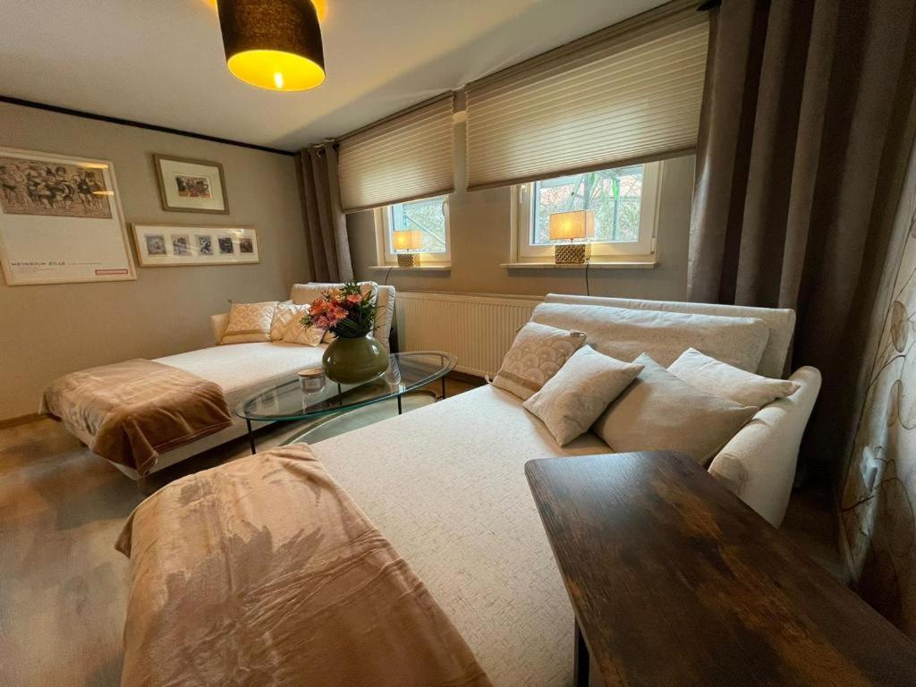 Кровать или кровати в номере Villa Pauline - FeWo "Champagne"