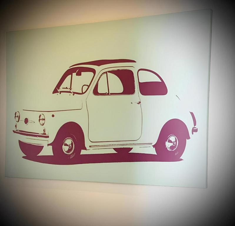 a drawing of a white van on a wall at Check-in Hamburg in Hamburg