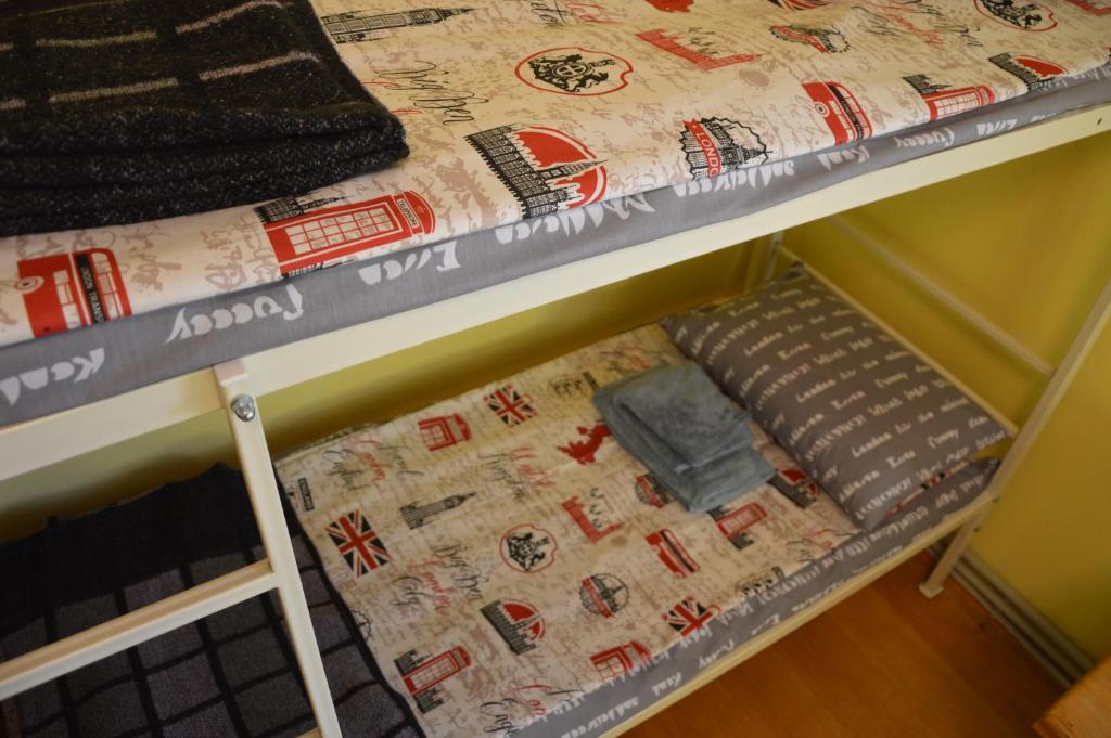 Postel nebo postele na pokoji v ubytování Хостел ПІД ФІКУСОМ