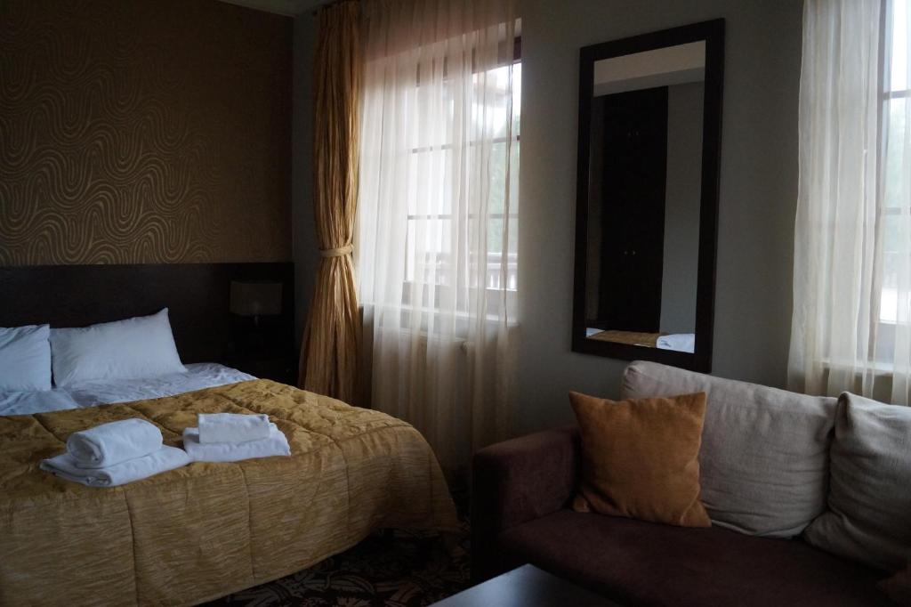 Posteľ alebo postele v izbe v ubytovaní Hotel Słoneczny Brzeg