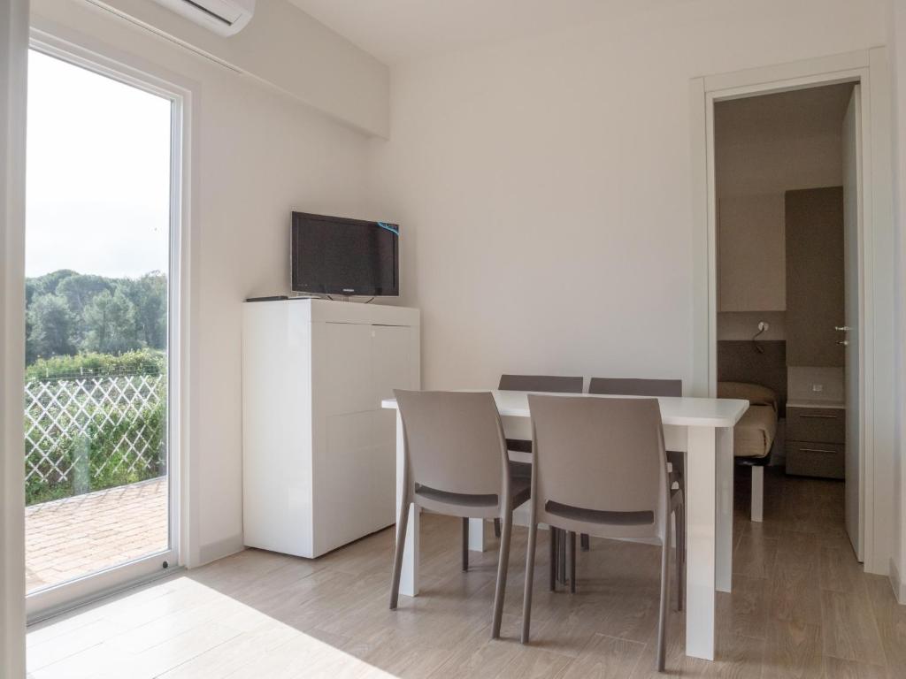 TV a/nebo společenská místnost v ubytování Santo Stefano Village
