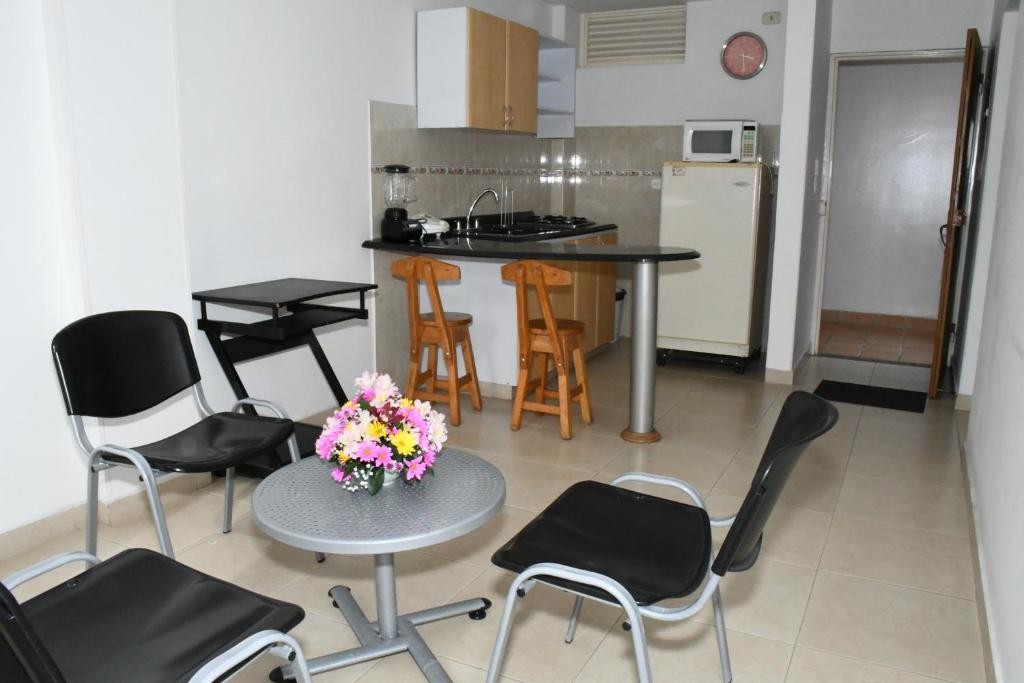 Kuchyň nebo kuchyňský kout v ubytování Apartahotel Los Cerezos